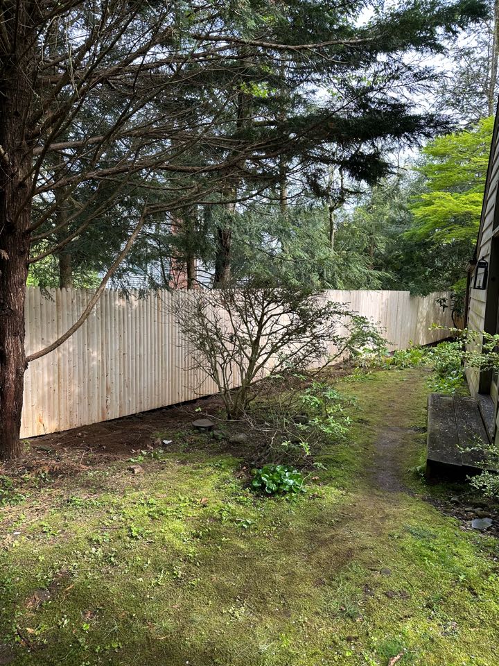 Westport, CT - A beautiful and practical spruce stockade fence in Westport to keep the dog in and the deer out! Westport, CT - A beautiful and practical spruce stockade fence in Westport to keep the dog in and the deer out!