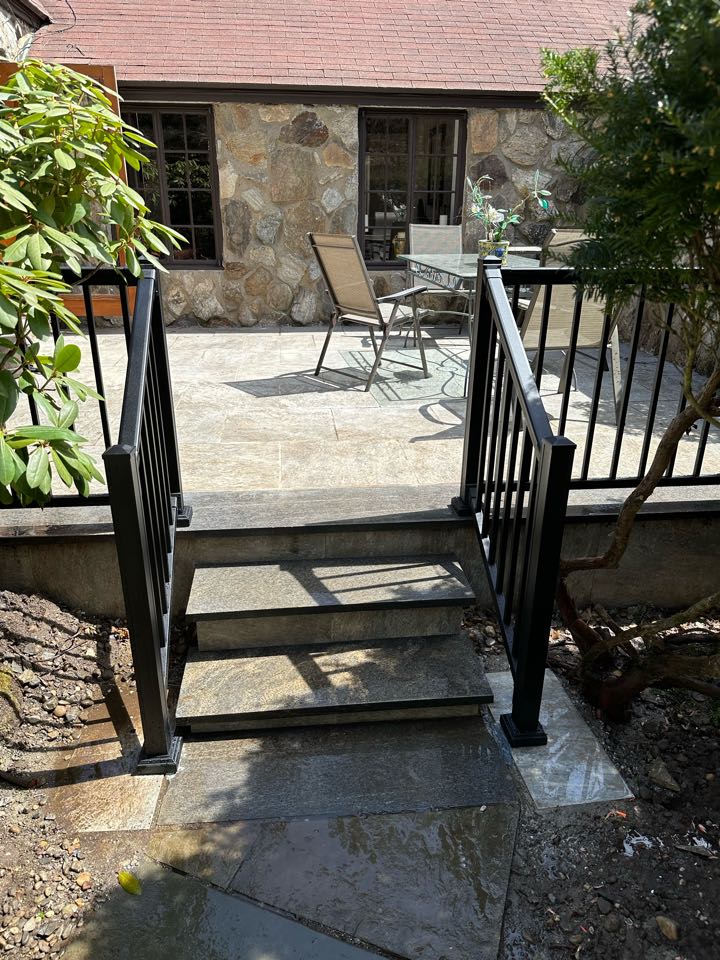 At the same time and place, we installed a new hand rail to keep the family safe. Good looking and functional!