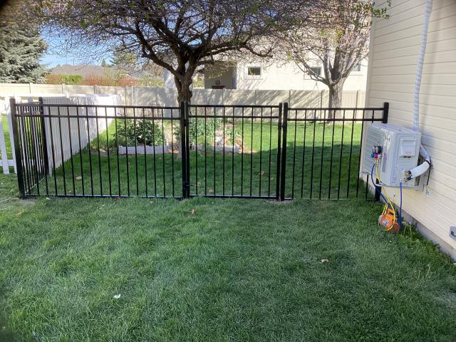 Meridian, ID - Another Ornamental and Vinyl fence. Now their son and new puppy can safely play outside! Meridian, ID - Another Ornamental and Vinyl fence. Now their son and new puppy can safely play outside!