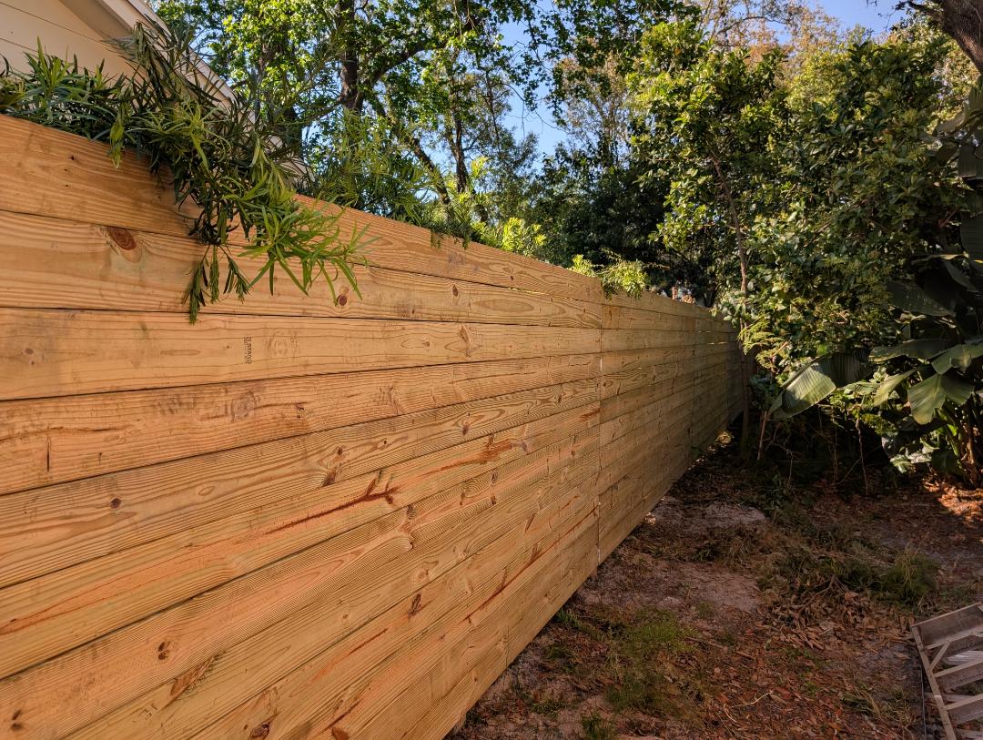 Horizontal Pine fence with a little Stockade on the front in Jax Beach 
