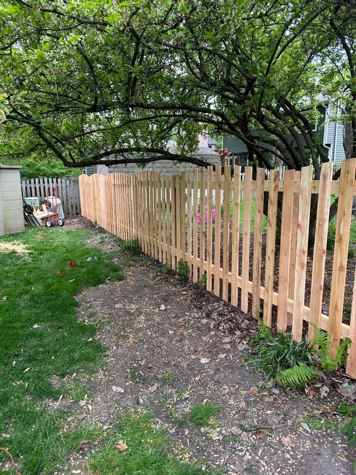 Customer wanted to replace the picket fence in the back yard in Wheaton. We installed an arched top picket fence. Turned out great. 